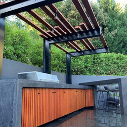 Outdoor Kitchen and Bar | polished concrete top island with timber front - BBQs