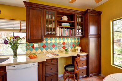 Example of a tuscan galley terra-cotta tile and pink floor enclosed kitchen design in San Diego with recessed-panel cabinets, medium tone wood cabinets, quartz countertops, green backsplash, ceramic backsplash and beige countertops