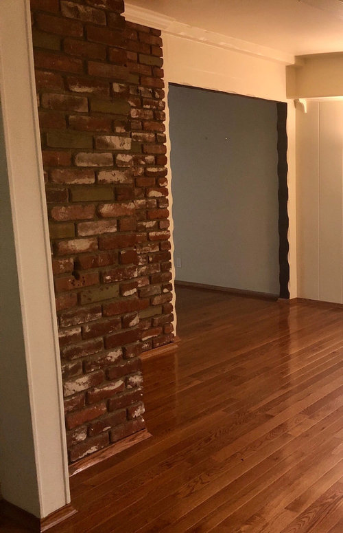 Help! Ideas for trim around brick fireplace and wooden beams?