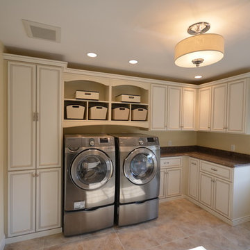 Antique White Laundry Room Cabinetry