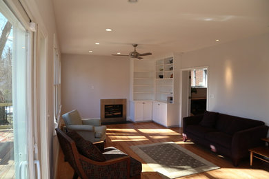 Example of a transitional family room design in DC Metro