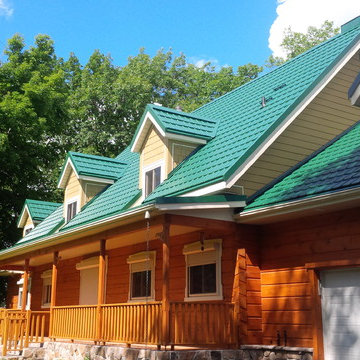 Ontario log homes with Hy-Grade's permanent steel roofing solution