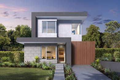 Design ideas for a mid-sized modern home design in Melbourne.