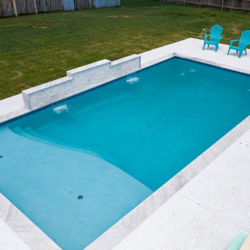 Modern Rectangular Backyard Swimming Pool with Water Features