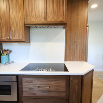 Rich & Refined: Custom Walnut Kitchen Remodel with White Quartz & Oak Flooring