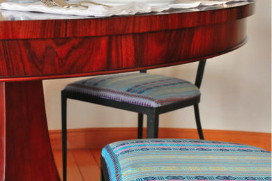 Inspiration for a small timeless medium tone wood floor great room remodel in San Diego with white walls