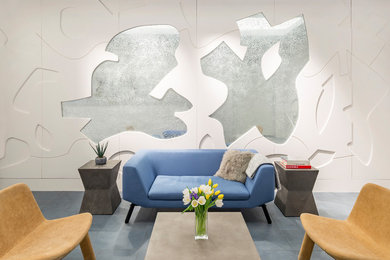 Inspiration for a mid-sized contemporary formal and enclosed concrete floor and gray floor living room remodel in Other with white walls, no fireplace and no tv
