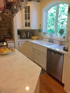 Off white kitchen cabinets with quartz countertops