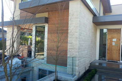 Example of a minimalist exterior home design in Vancouver