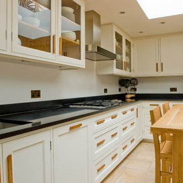 Painted kitchen with Oak island table.
