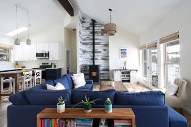 Example of a beach style living room design in Other