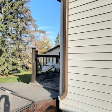 Living room, gutters and downspouts