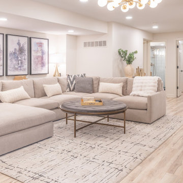 Warm & Inviting Basement Retreat with Custom Bar + Entertainment Center