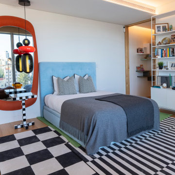 Bedroom with Orange Mirror, Blue Headboard and Bookshelves, Lisbon