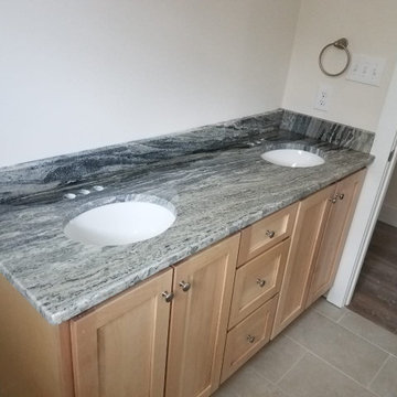 Fantasy Brown Dolomite + Light Wood Cabinets