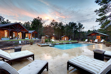 Example of a mountain style home design design in Houston