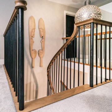 Elegant Curved Oak Staircase with Metal Spindles & Goose Neck