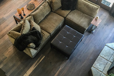 Example of a mid-sized mountain style dark wood floor living room design in Los Angeles with beige walls