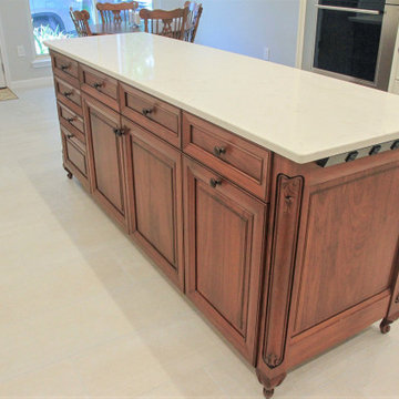 Custom Walnut Island Brings a Furniture Feel to the Kitchen