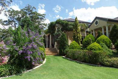 Photo of a traditional home design in Sunshine Coast.