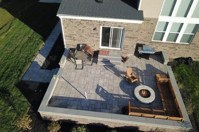Inspiration for a modern concrete paver patio remodel in Detroit
