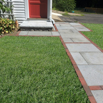Granite and brick patio, entrance steps and walkway