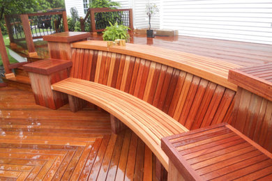 Inspiration for a large timeless backyard deck remodel in New York with no cover