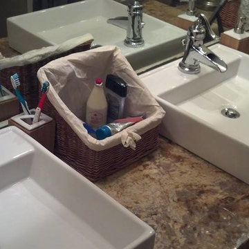 Diamond Cabinetry w/Colonial Gold Granite and Travertine Tub Surround