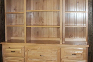Example of an arts and crafts home office design in Other