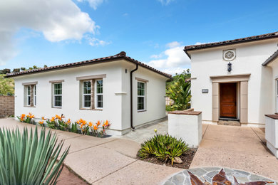 Example of a tuscan exterior home design in San Diego