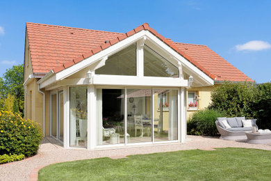 Photo of a farmhouse conservatory in Nancy.