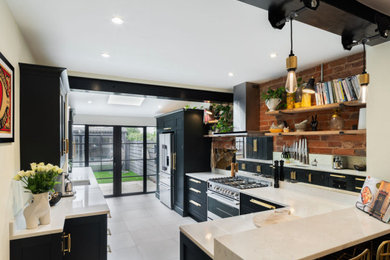 Inspiration for an industrial kitchen in Surrey.