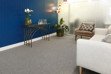 Design ideas for a contemporary living room in Gold Coast - Tweed with blue walls, carpet and panelled walls.