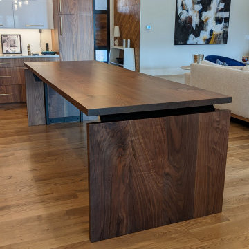 Custom walnut slab island designed for a high-end residential in Colorado
