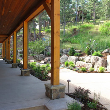 Porch Surrounded by Flower Beds