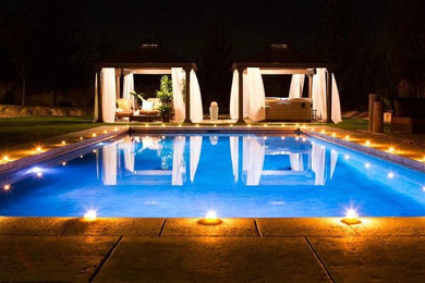 Example of a large backyard rectangular lap water slide design in Richmond