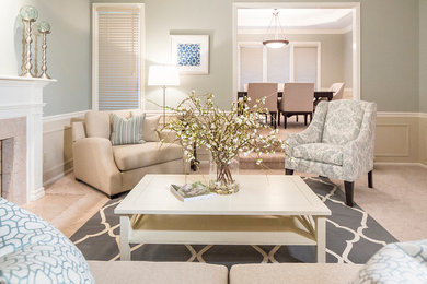 Living room - large coastal enclosed carpeted and beige floor living room idea in Seattle with blue walls, a standard fireplace and a plaster fireplace