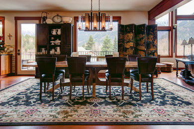 This is an example of a large arts and crafts separate dining room in Seattle with beige walls and dark hardwood floors.