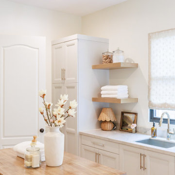 Custom Cabinetry and Open Shelving in Laundry Room