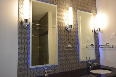 Bathroom - contemporary master bathroom idea in Edmonton with white cabinets, a two-piece toilet, an undermount sink and granite countertops