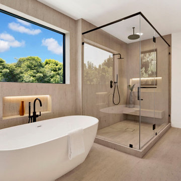 Primary bathroom with freestanding tub and glass shower
