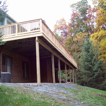 LARGE BASIC PRESSURE TREATED DECK WITH CEDAR INFILL AND BALUSTERS