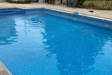 Inspiration for a shabby-chic style pool remodel in Toronto