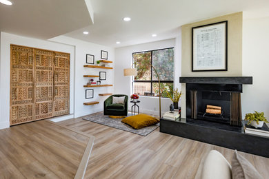 Example of a large 1960s open concept living room design in Los Angeles