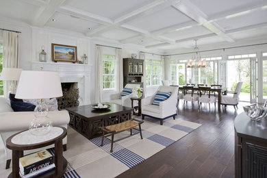 Beach style formal and open concept dark wood floor living room photo in Miami with white walls and a standard fireplace