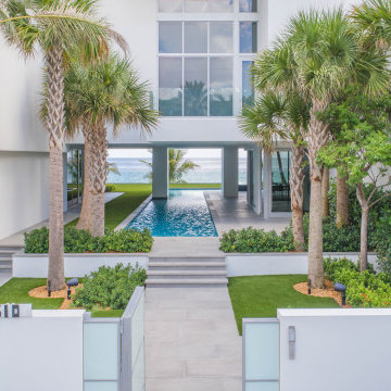 Custom Swimming Pool & Spa That Goes Underneath Part of the The House