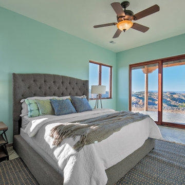 Spacious main bedroom with panoramic views