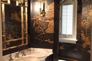 Bathroom - dark wood floor bathroom idea in Columbus with furniture-like cabinets, black cabinets and marble countertops