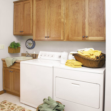 StarMark Cabinetry Cherry Laundry Room Cabinets