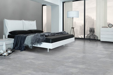 Bedroom - porcelain tile bedroom idea in Other